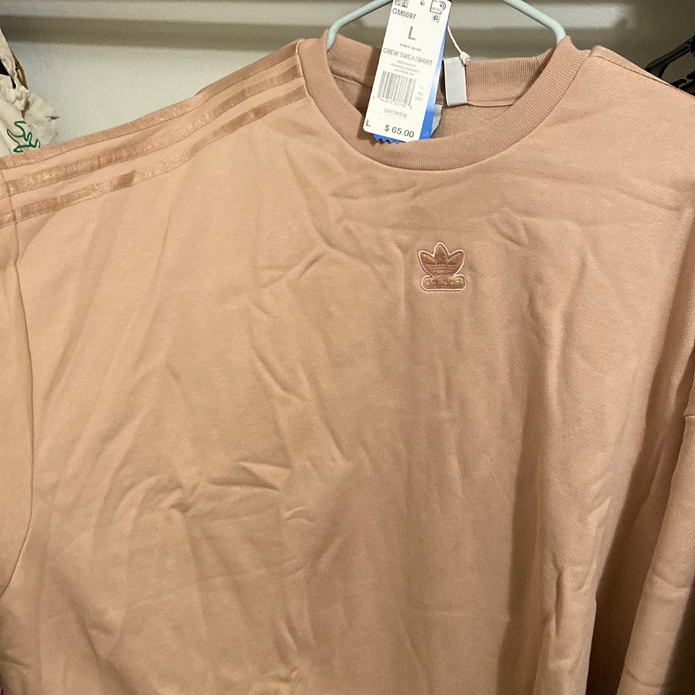 OVERSIZED STYLE RUNS LARGE